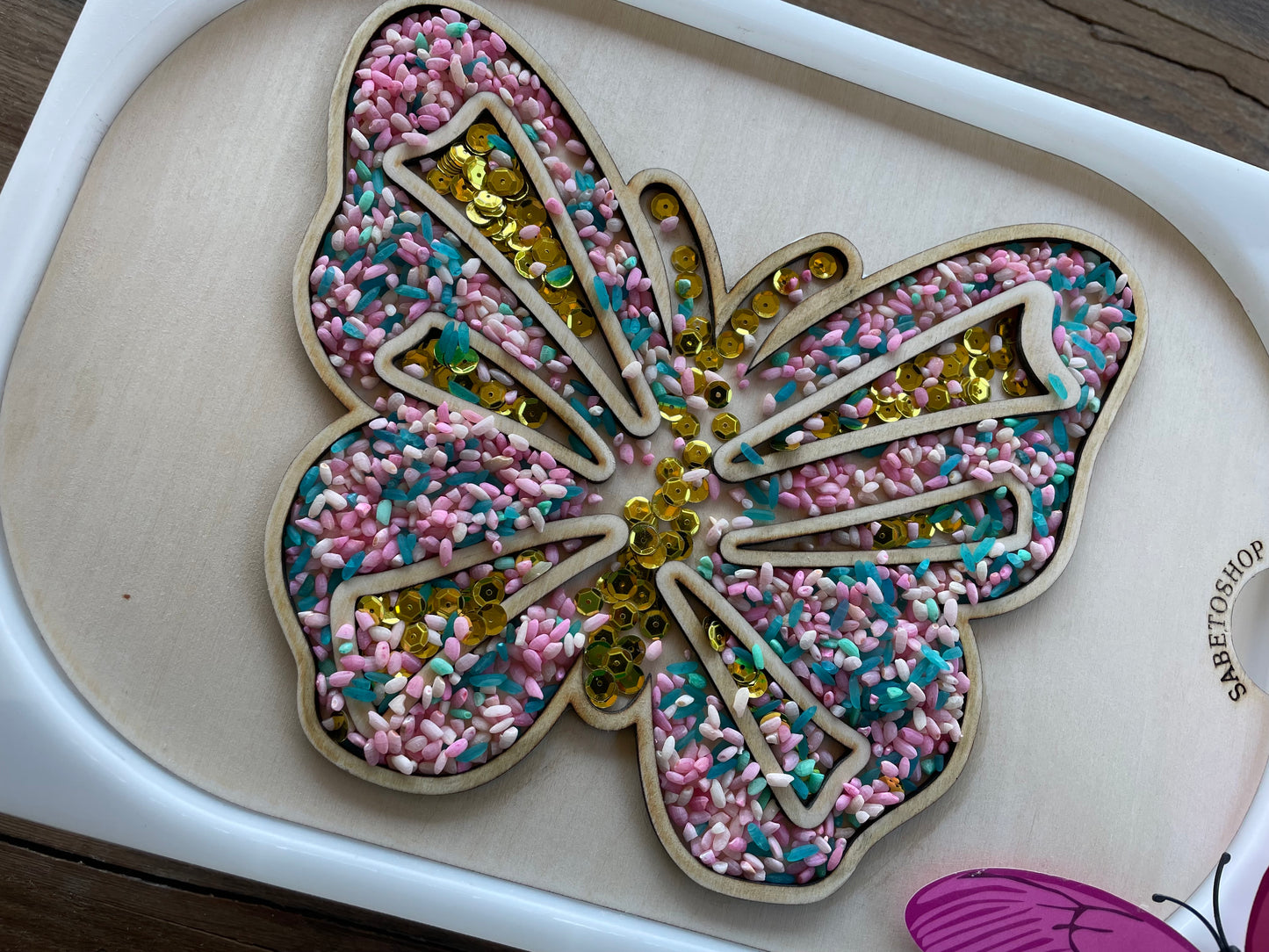 Plaque papillon transvasement