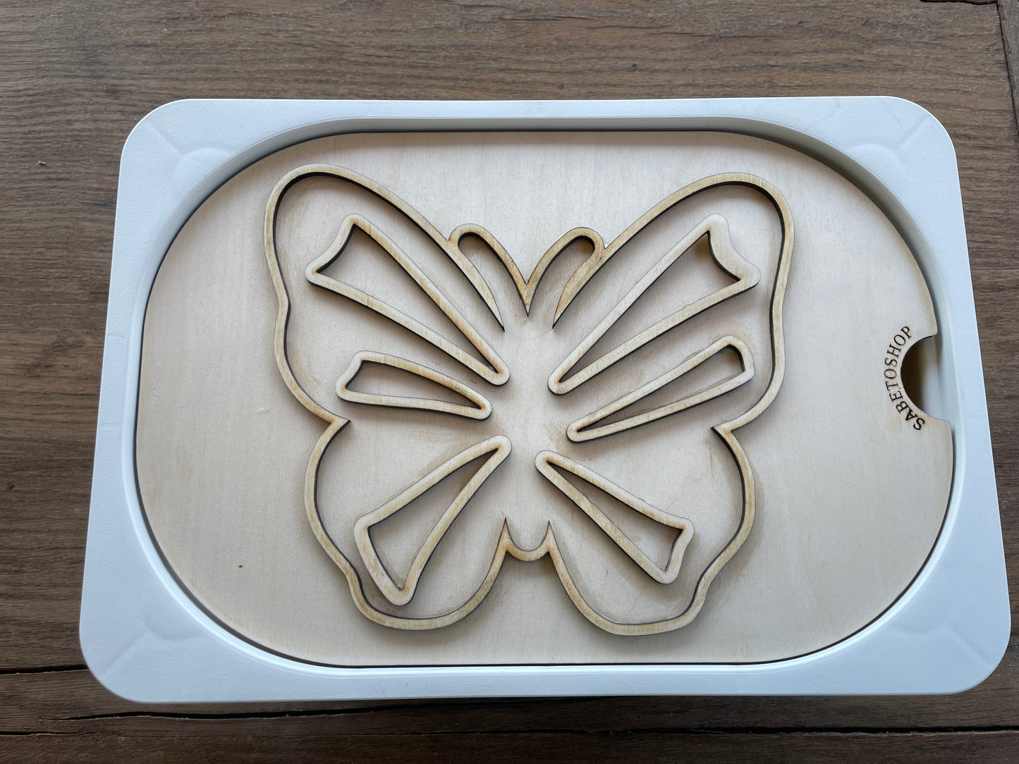 Plaque papillon transvasement
