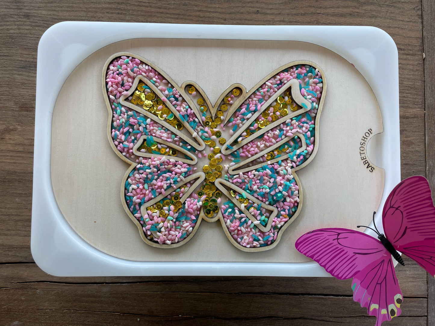 Plaque papillon transvasement
