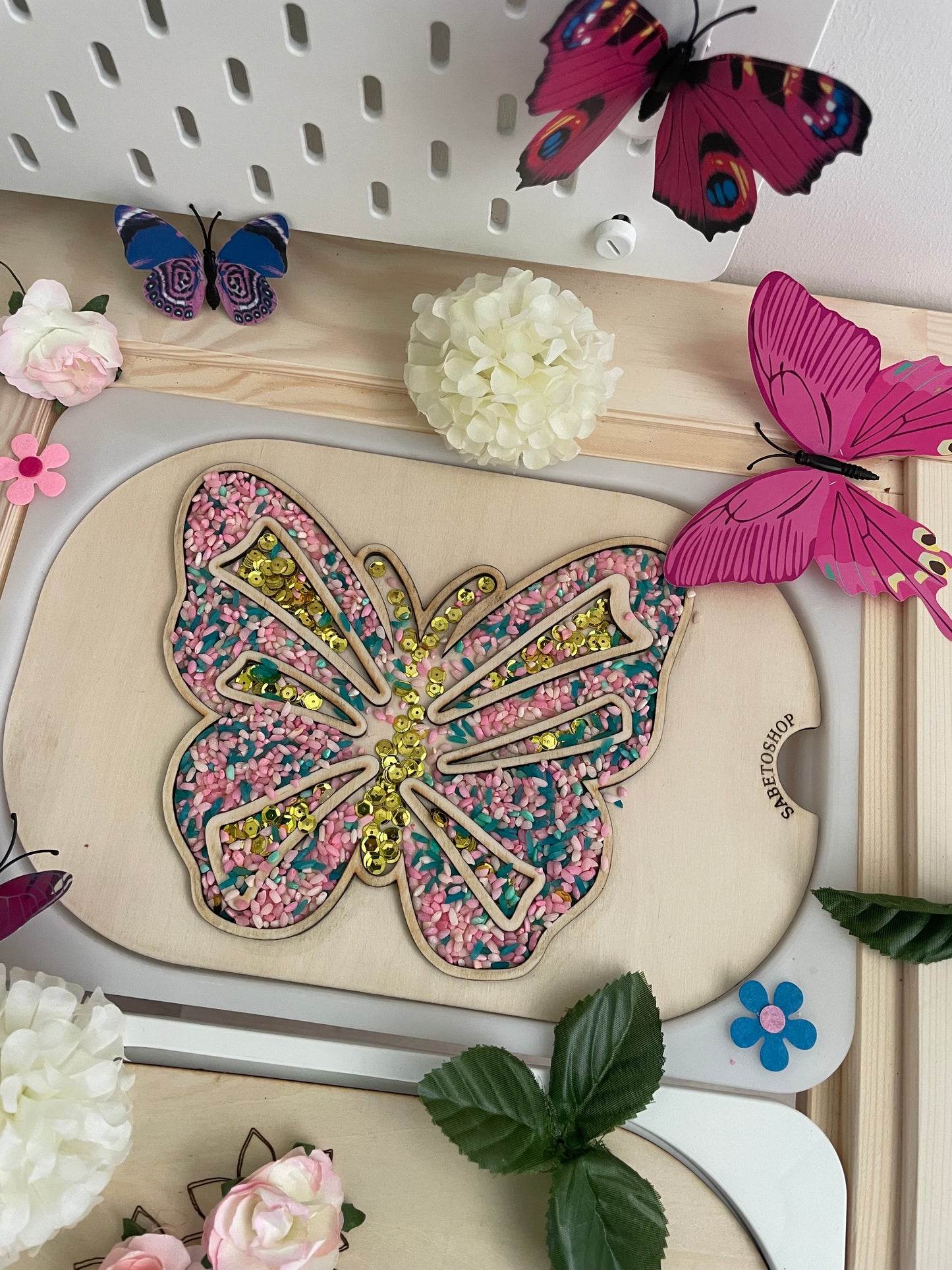 Plaque papillon transvasement