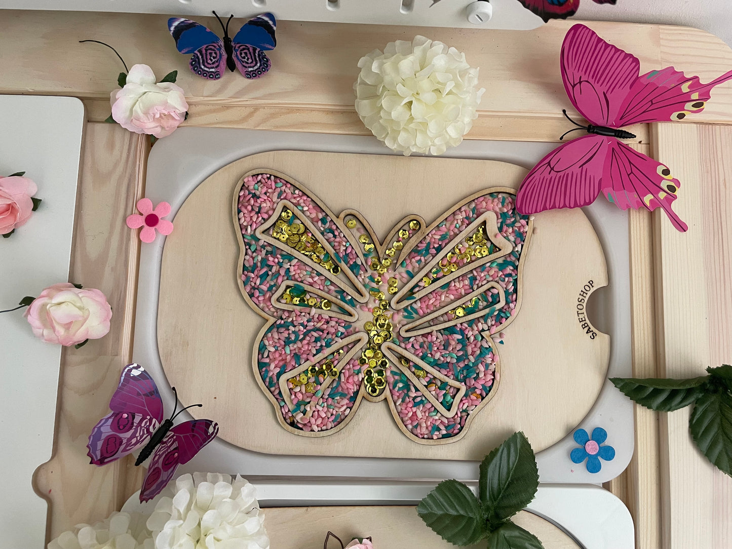 Plaque papillon transvasement