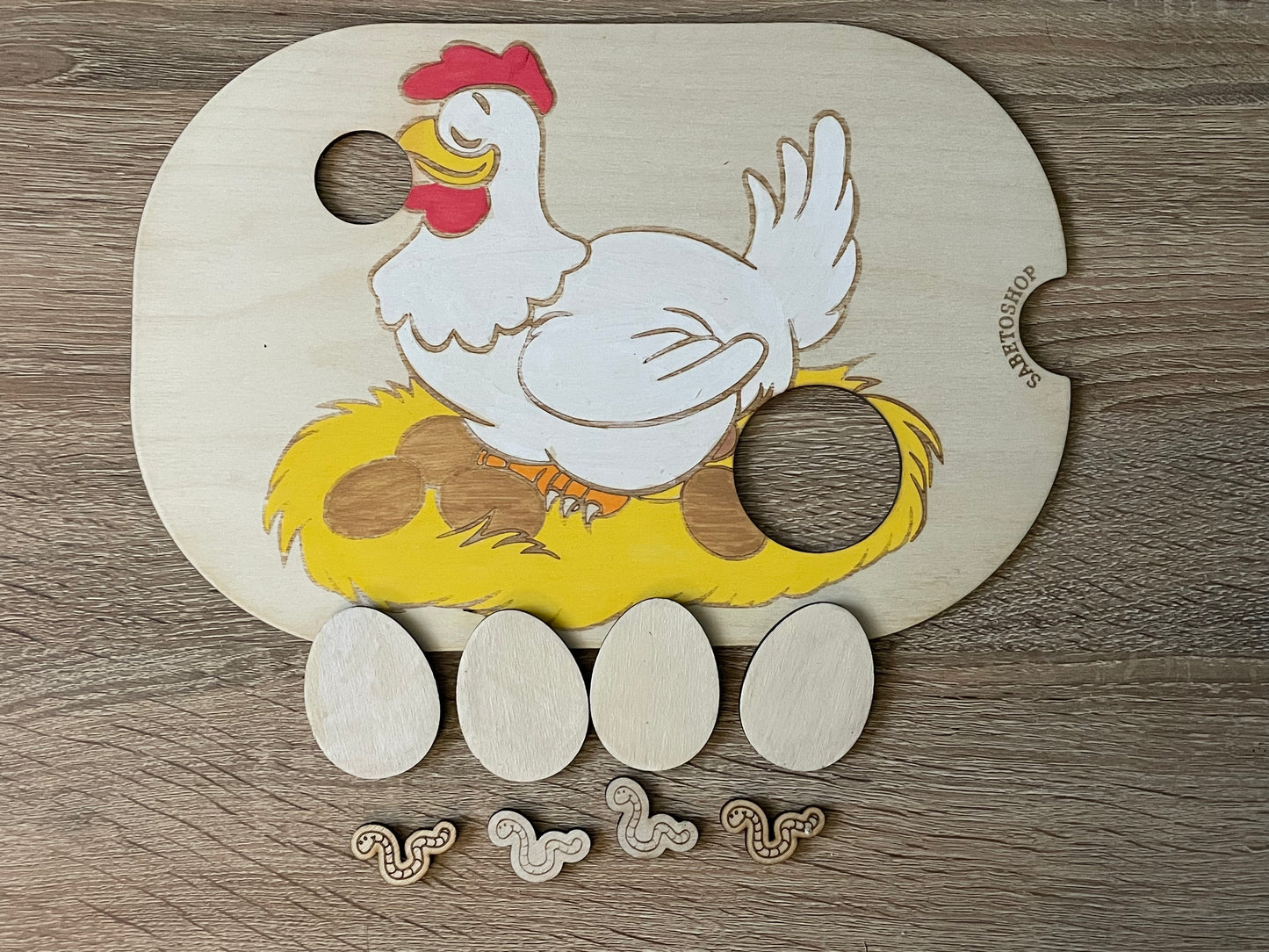 Insert la poules et des œufs