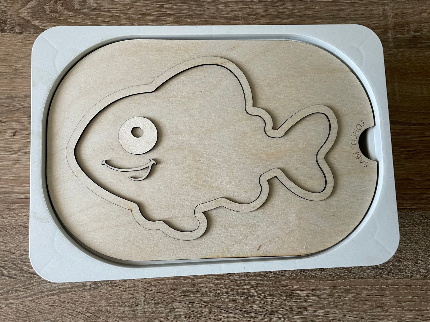 Insert du poisson à remplir