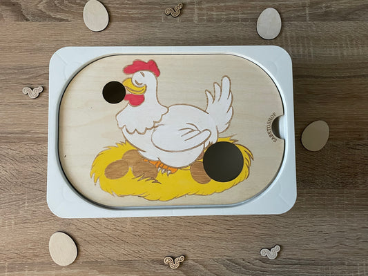 Insert la poules et des œufs
